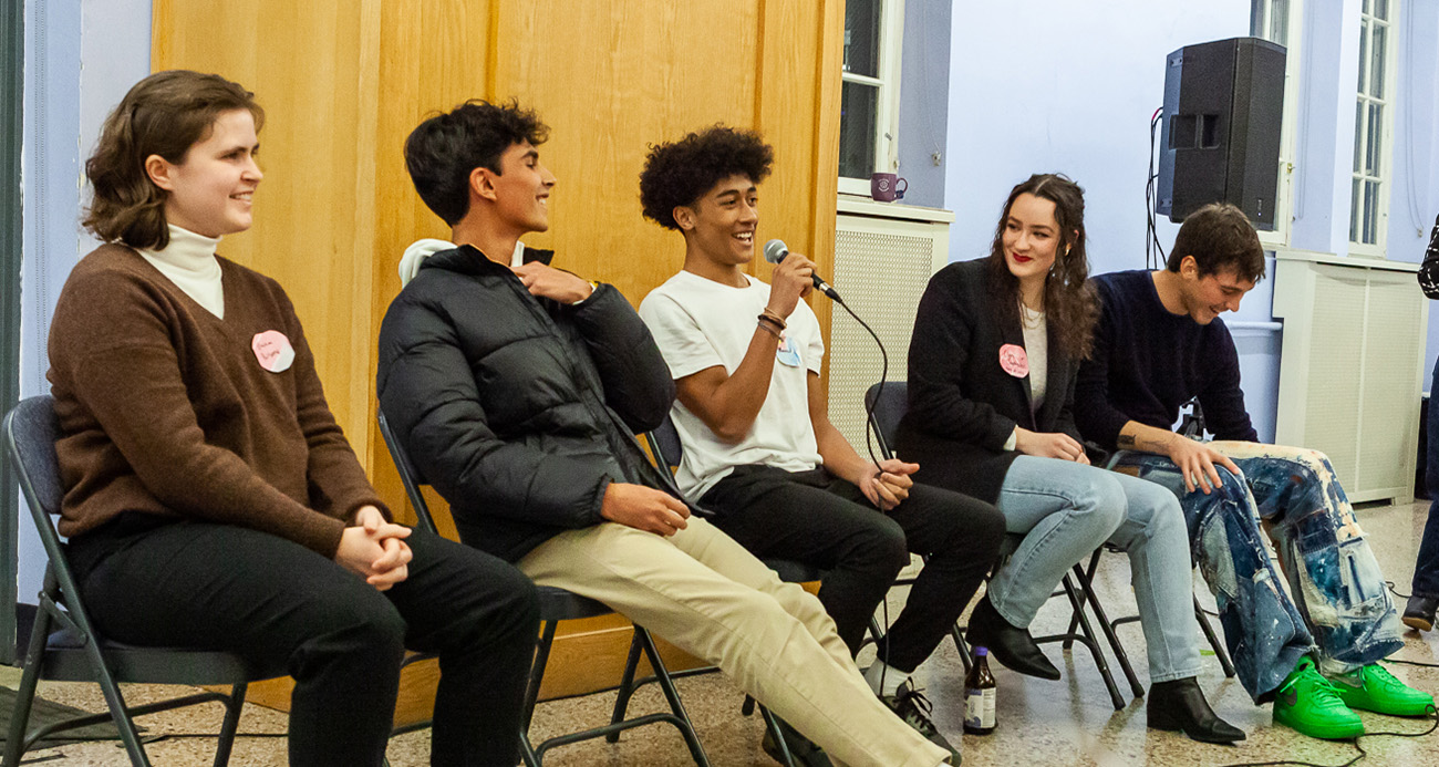 Five students reflect on their time at CLWS; in this photo, the graduates enjoy laughing together over a shared memory.