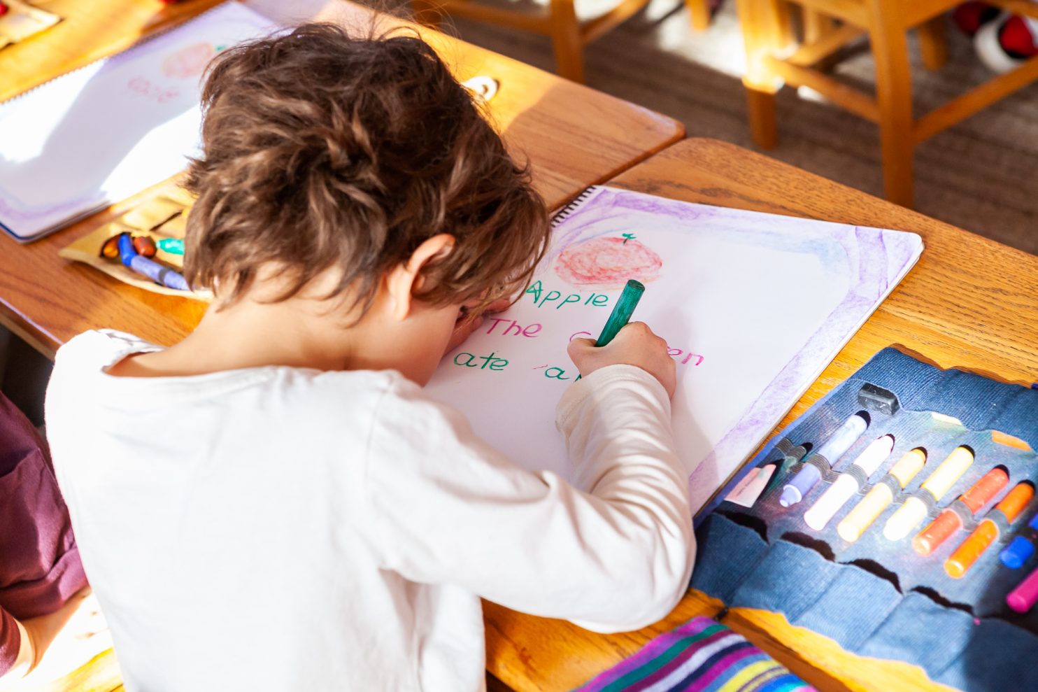 Waldorf student designing their textbook page